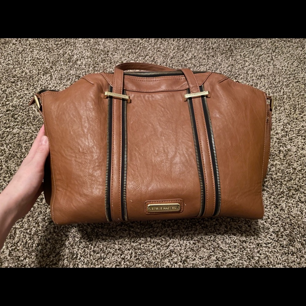 Steve Madden tore or small overnight bag. Gently used.